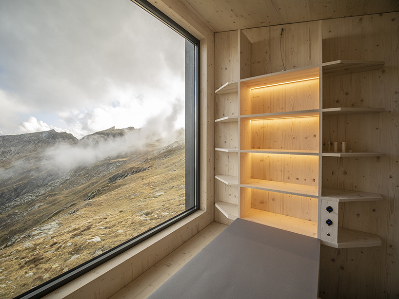 bcw collective cantilevers a bivouac hut above italian alpine valley 7