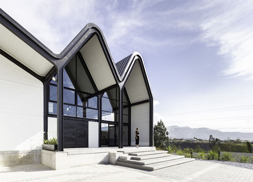 estudio felipe escudero designs a series of gable roofs clad in black aluminium