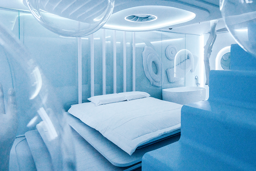 dreamy motel room interior by EFE recreates the feeling of floating on clouds