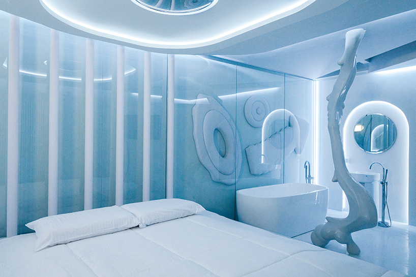 dreamy motel room interior by EFE recreates the feeling of floating on clouds