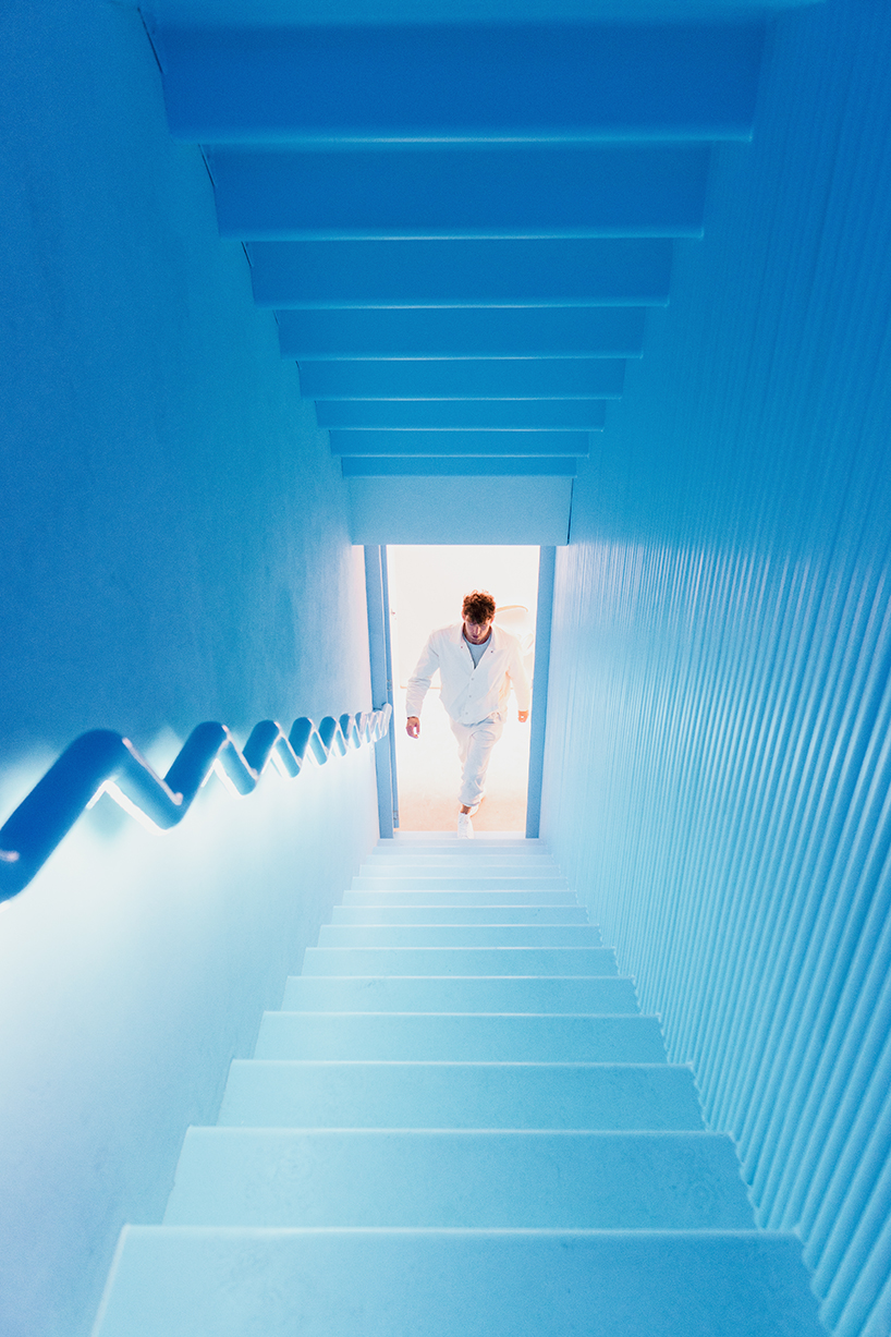 dreamy motel room interior by EFE recreates the feeling of floating on clouds