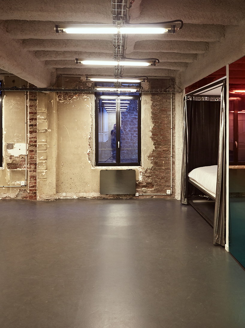 FREAKS assumes industrial aesthetics for performing arts space in paris designboom