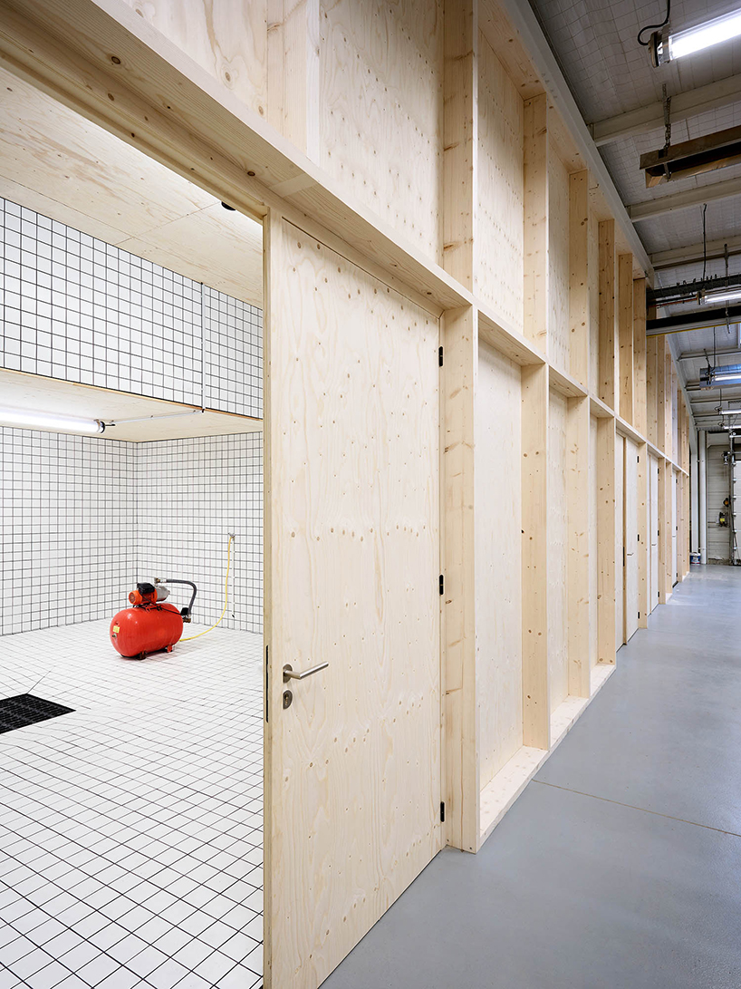 freaks wraps a double skin of corrugated stainless steel around office building in paris designboom