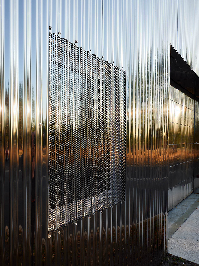 freaks wraps a double skin of corrugated stainless steel around office building in paris designboom