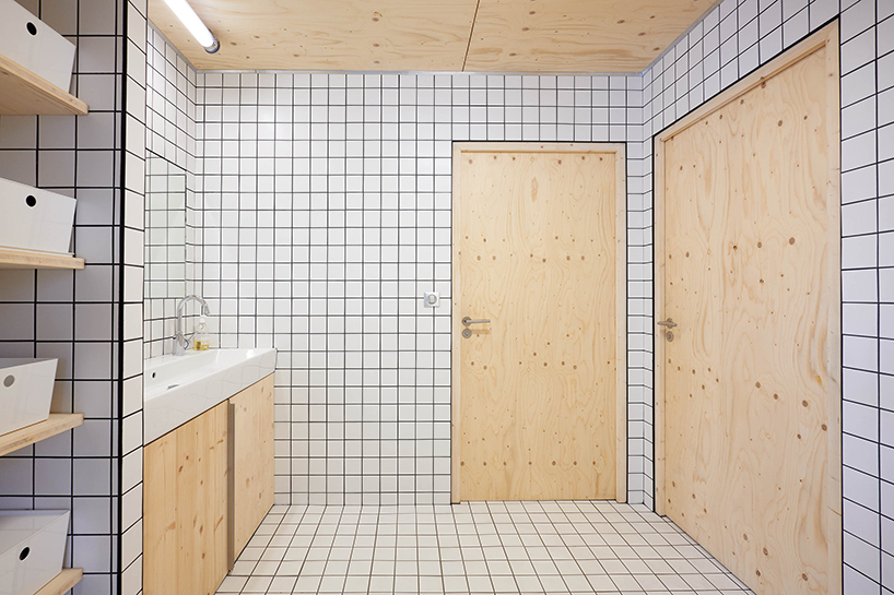 freaks wraps a double skin of corrugated stainless steel around office building in paris designboom