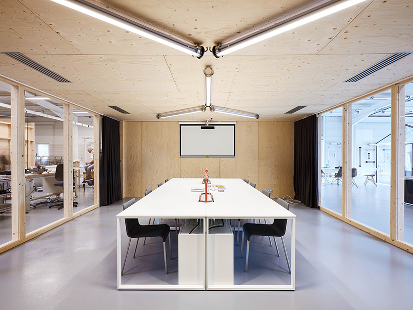 freaks wraps a double skin of corrugated stainless steel around office building in paris designboom