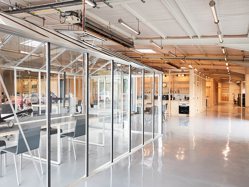 freaks wraps a double skin of corrugated stainless steel around office building in paris designboom