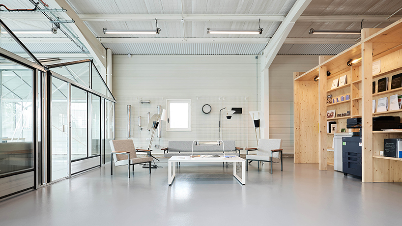 freaks wraps a double skin of corrugated stainless steel around office building in paris designboom