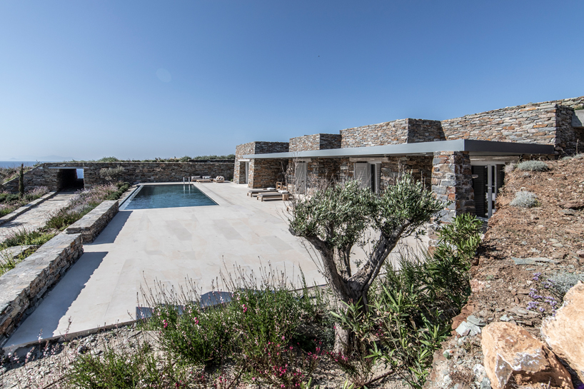 bobotis+bobotis weaves semi-submerged villas into the rugged landscape of kea island, greece