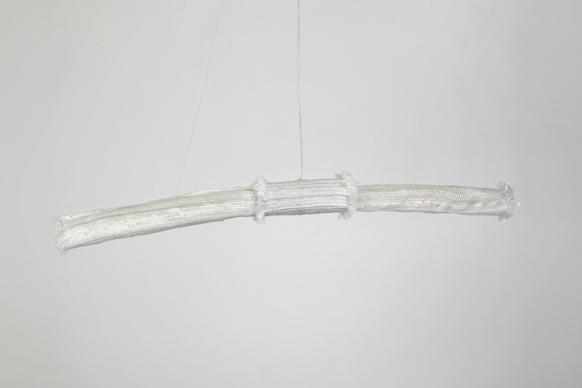 'RE_DE' is a lamp made from recycled fishing nets by andré teoman and ana rita pires designboom