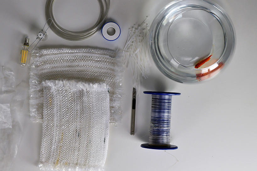 'RE_DE' is a lamp made from recycled fishing nets by andré teoman and ana rita pires designboom