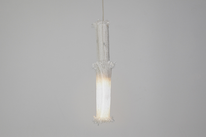 'RE_DE' is a lamp made from recycled fishing nets by andré teoman and ana rita pires designboom