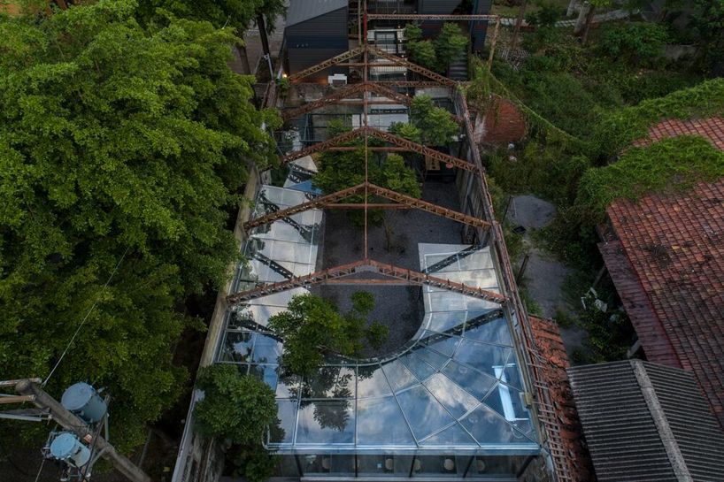 studio apl creates stone courtyard life in 80 years grain bin 2