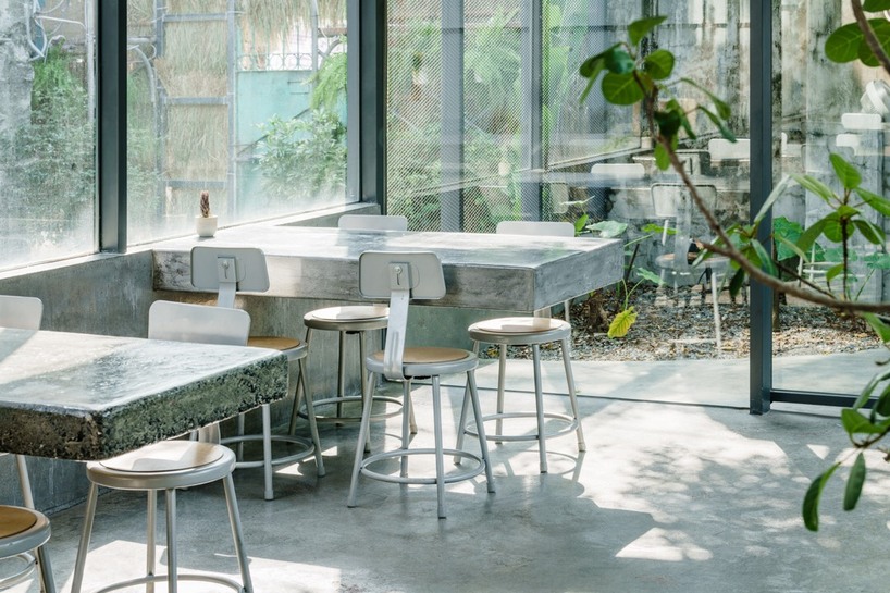 studio apl creates stone courtyard life in 80 years grain bin 7