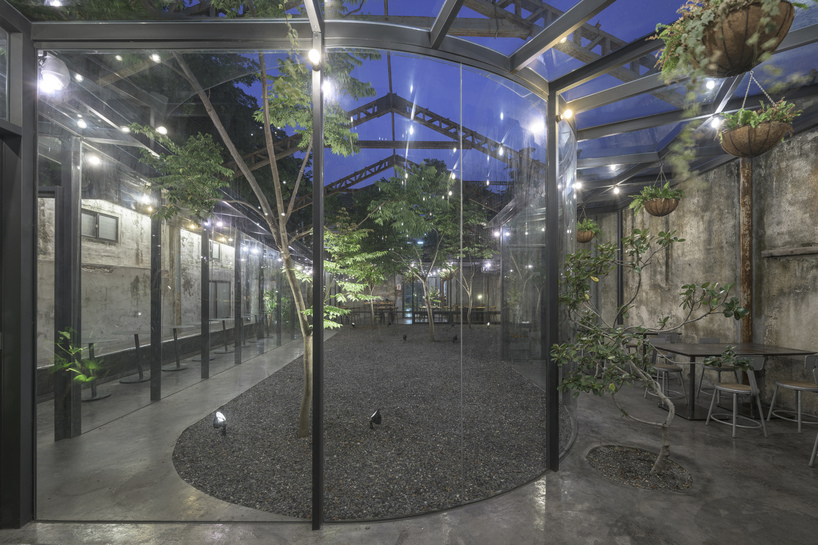 studio apl creates stone courtyard life in 80 years grain bin 8