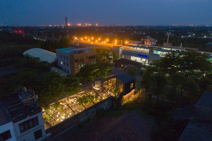 studio apl creates stone courtyard life in 80 years grain bin 9