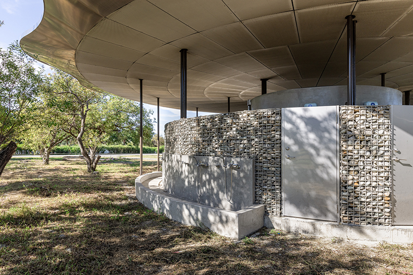 lotus garden a waterside ecological cycling station with metal lotus leaves floating in dapo pond taiwan 6