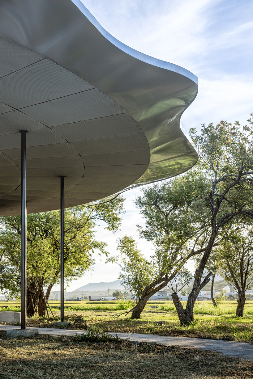 lotus garden a waterside ecological cycling station with metal lotus leaves floating in dapo pond taiwan 9