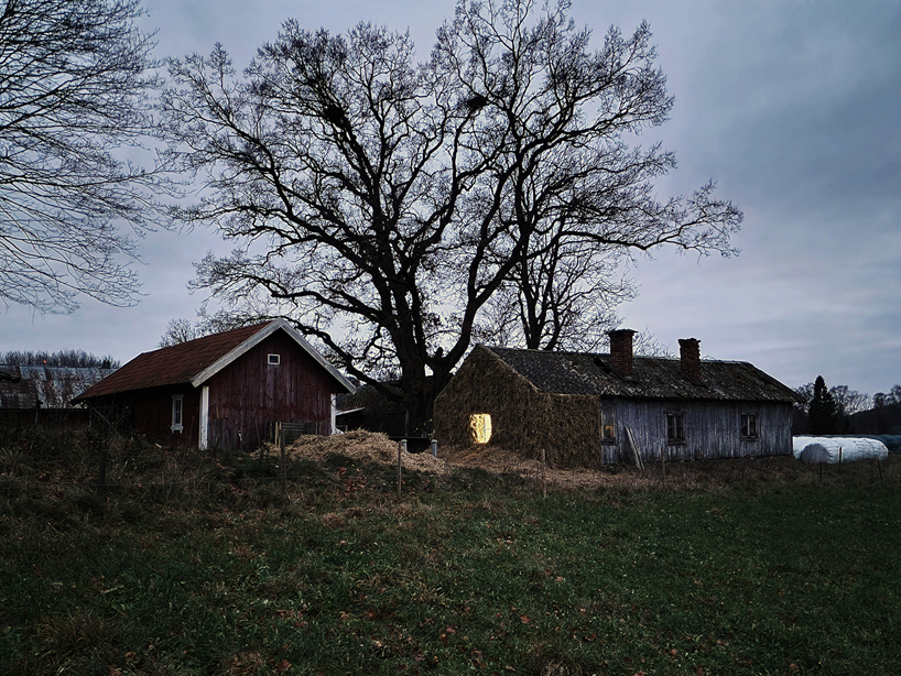 ulf mejergren revives dilapidated swedish farm house with hay from its land