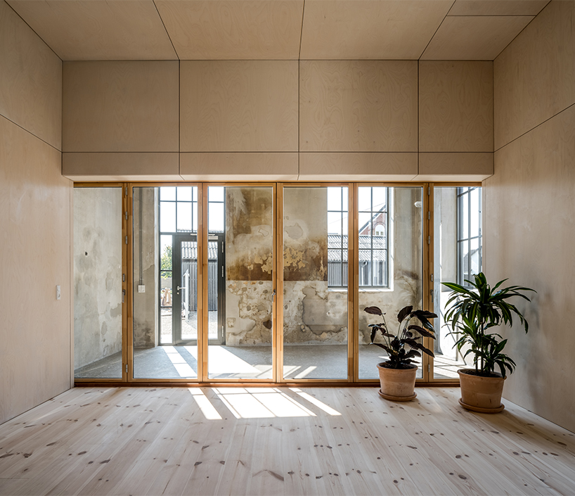 arcgency turns a former factory into affordable housing in rural denmark designboom