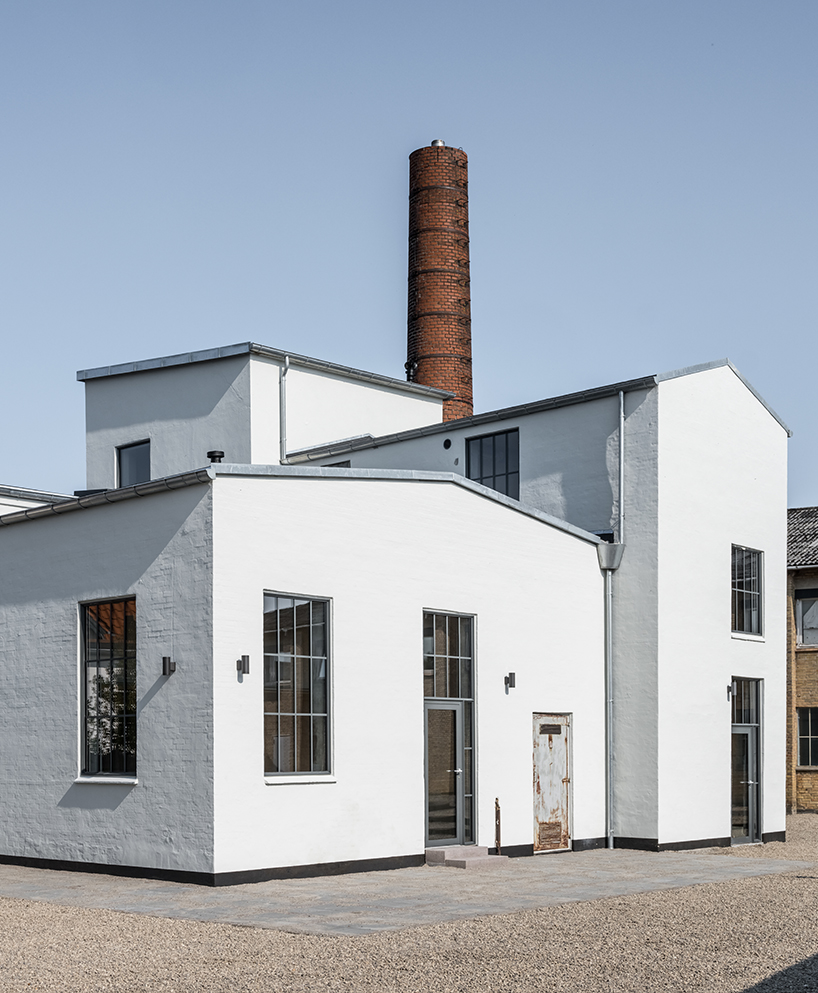 arcgency turns a former factory into affordable housing in rural denmark designboom