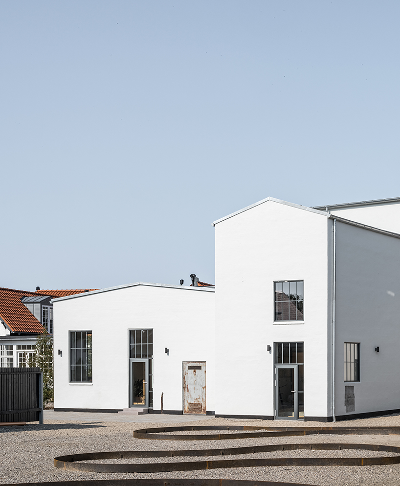 arcgency turns a former factory into affordable housing in rural denmark designboom