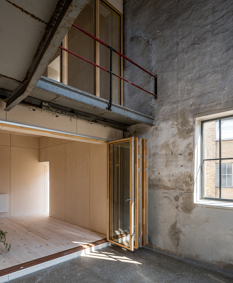 arcgency turns a former factory into affordable housing in rural denmark designboom