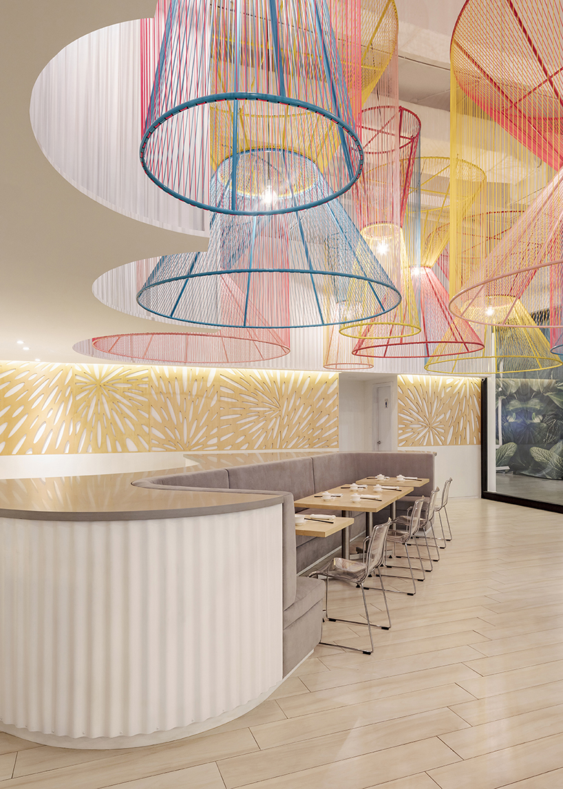 colorful lanterns float above quito restaurant designed by hou de sousa 11