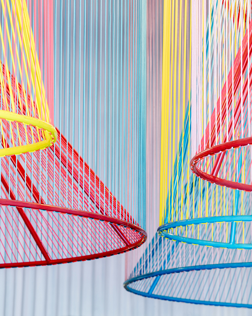 colorful lanterns float above quito restaurant designed by hou de sousa 2