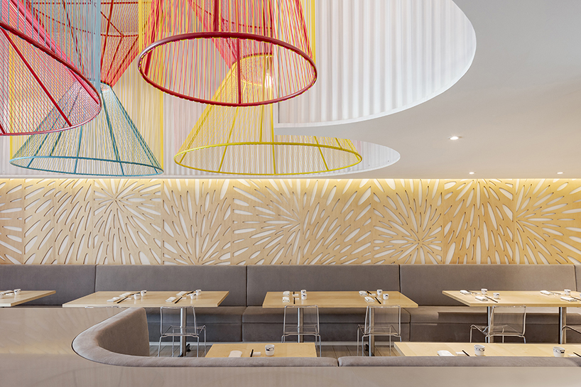 colorful lanterns float above quito restaurant designed by hou de sousa 4