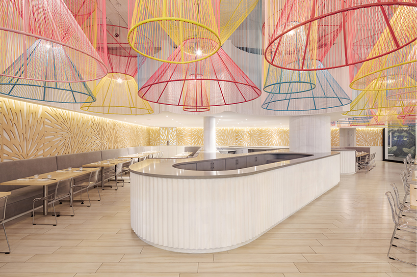 colorful lanterns float above quito restaurant designed by hou de sousa 5