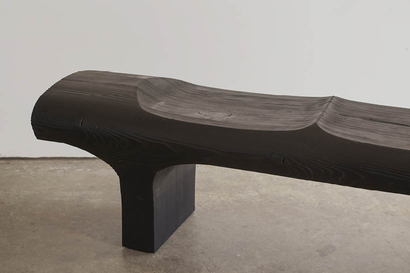 akos hubers monolithic sunroom bench showcases the beauty of the reclaimed material 2