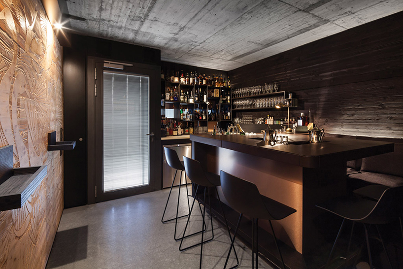 seven swans and the tiny cup cocktail bar hidden fortress designboom