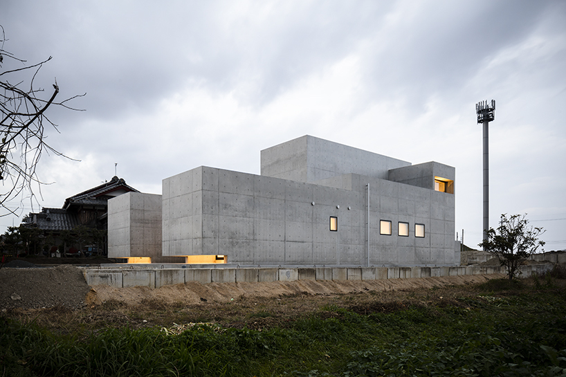 FORM builds thick concrete volumes to create the tranquil house in japan