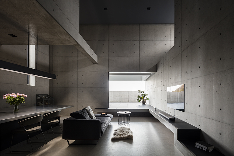 FORM builds thick concrete volumes to create the tranquil house in japan