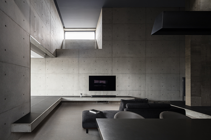 FORM builds thick concrete volumes to create the tranquil house in japan