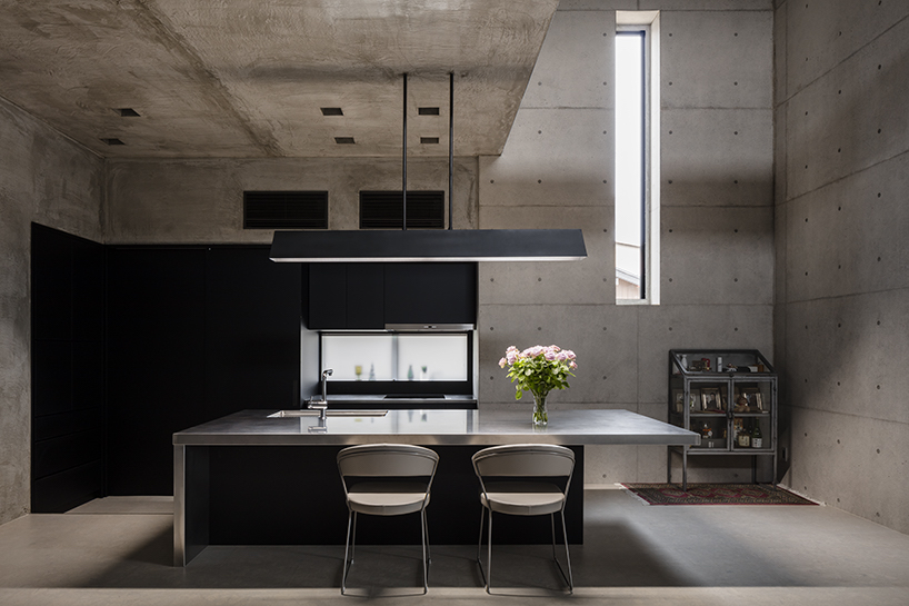 FORM builds thick concrete volumes to create the tranquil house in japan