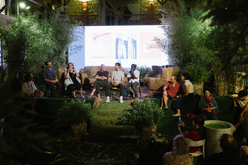 organic and artificial installation at jerusalem design week poses a thriving urban garden