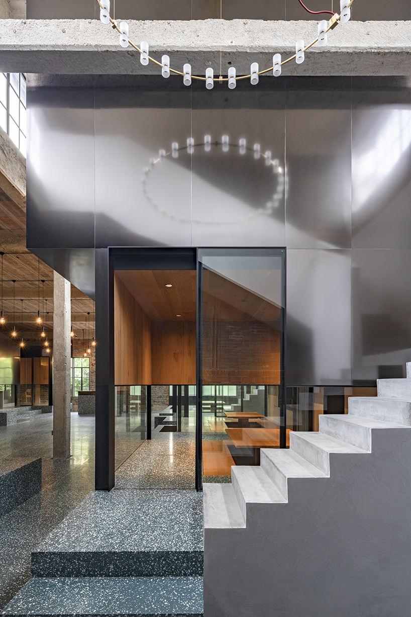 linehoue stacks stainless steel teahouses on green terrazzo in shanghai