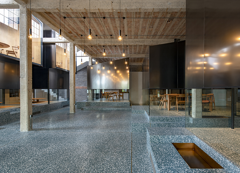 linehoue stacks stainless steel teahouses on green terrazzo in shanghai