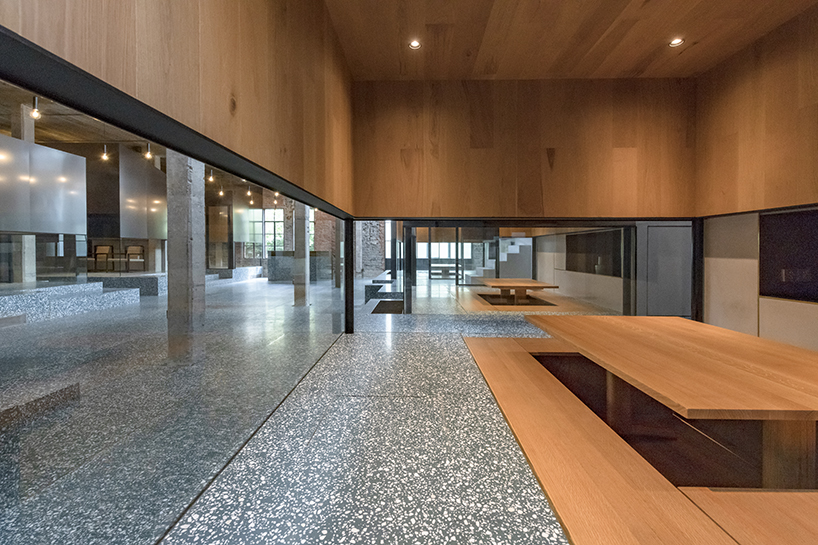 linehoue stacks stainless steel teahouses on green terrazzo in shanghai