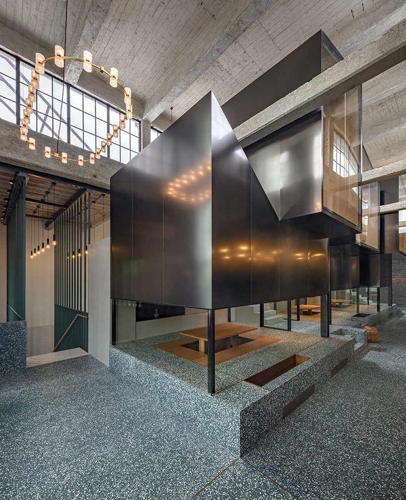 linehoue stacks stainless steel teahouses on green terrazzo in shanghai