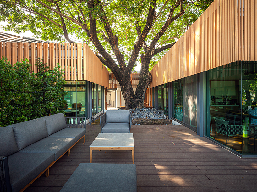 junsekino plans 'o-tree house' around a lush courtyard in thailand designboom