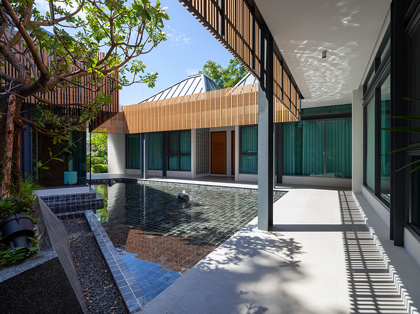junsekino plans 'o-tree house' around a lush courtyard in thailand designboom