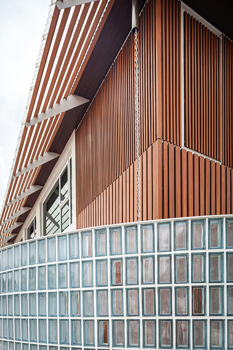 permeable lattice facade & translucent elements envelop bangkok residence by junsekino