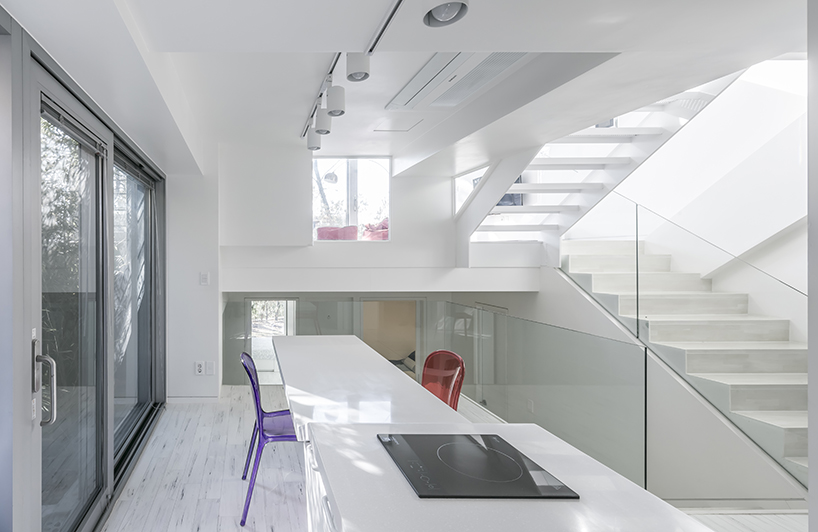 IROJE KHM forms zig-zagged colored townhouses for 'stella fiore' project in south korea designboom