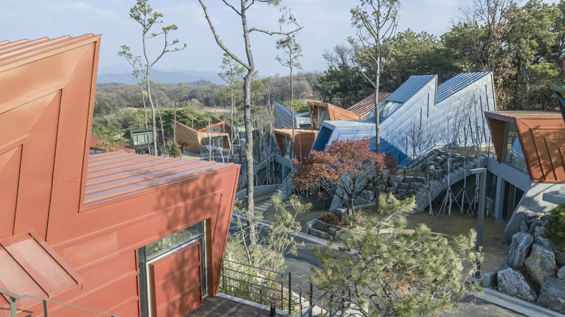 IROJE KHM forms zig-zagged colored townhouses for 'stella fiore' project in south korea designboom