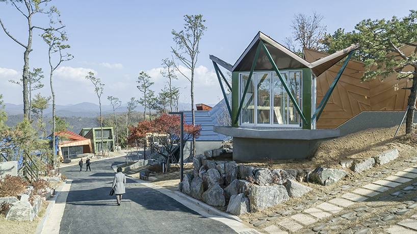 IROJE KHM forms zig-zagged colored townhouses for 'stella fiore' project in south korea designboom