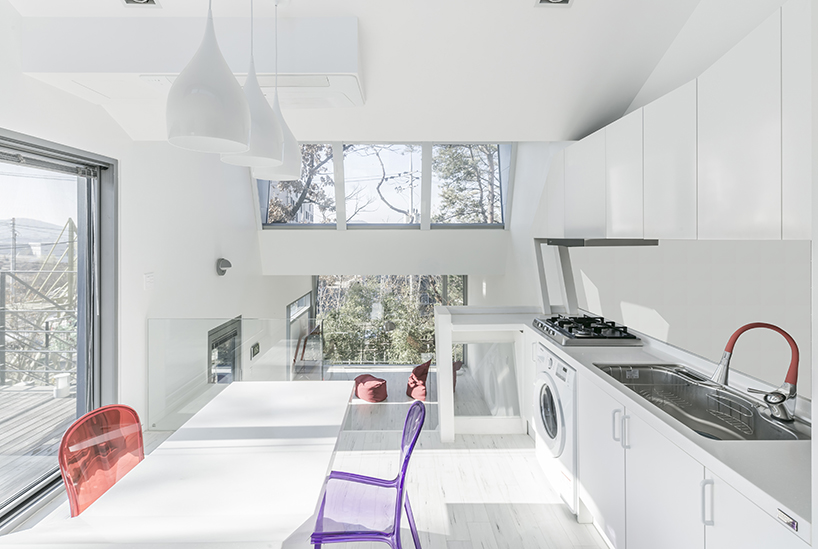 IROJE KHM forms zig-zagged colored townhouses for 'stella fiore' project in south korea designboom