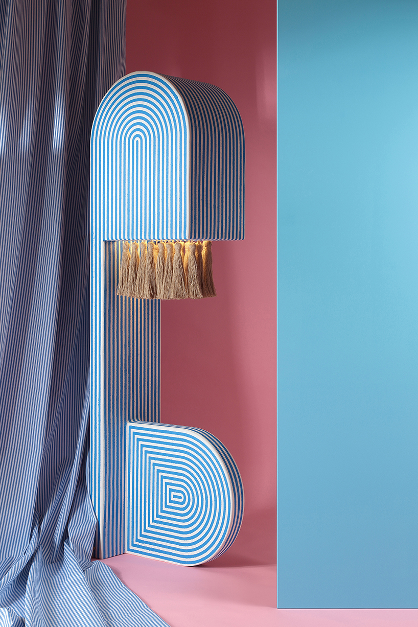 richard yasmine's lamps intertwine sleek architectural lines with organic jute textures